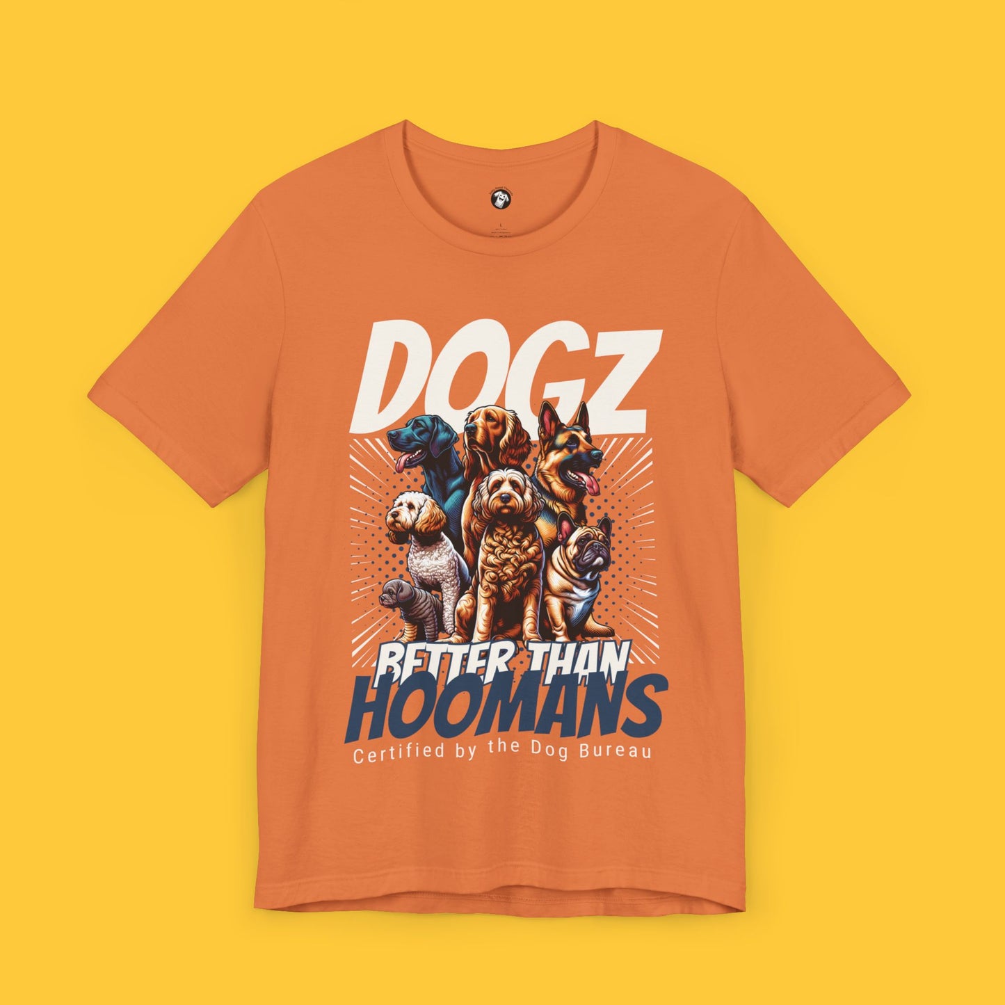 T-shirt featuring a graphic of multiple dog breeds and the quote "DOGZ: Better Than Hoomans" with the subtitle "Certified by the Dog Bureau."