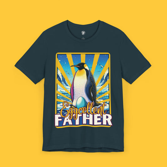  Graphic tee with a penguin father and the phrase "Eggcellent Father" in vintage-style design.