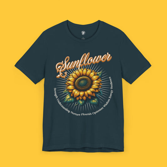 T-shirt featuring a detailed sunflower with the acronym "Strength Understanding Nurture Flourish Optimism Wisdom Energy Resilience" surrounding the bloom.